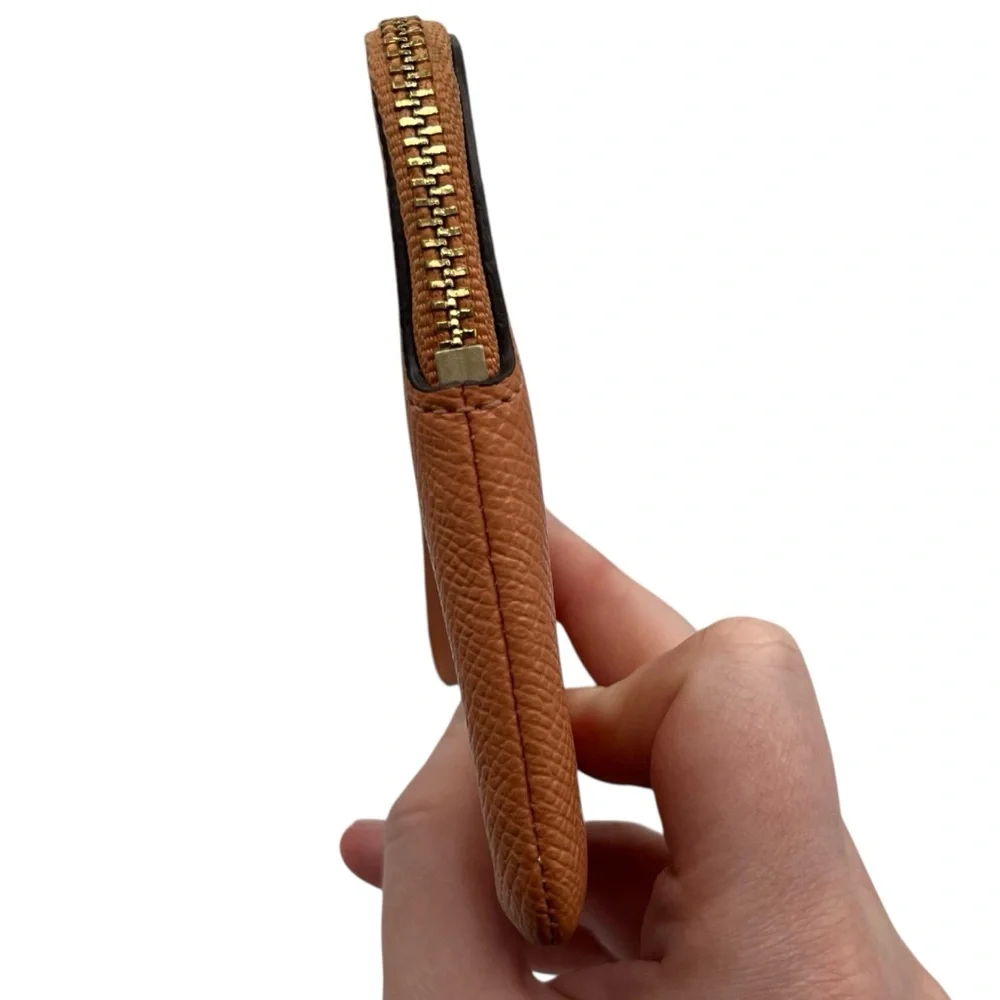 Coach corner zip